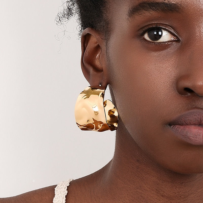 Wide women's earrings