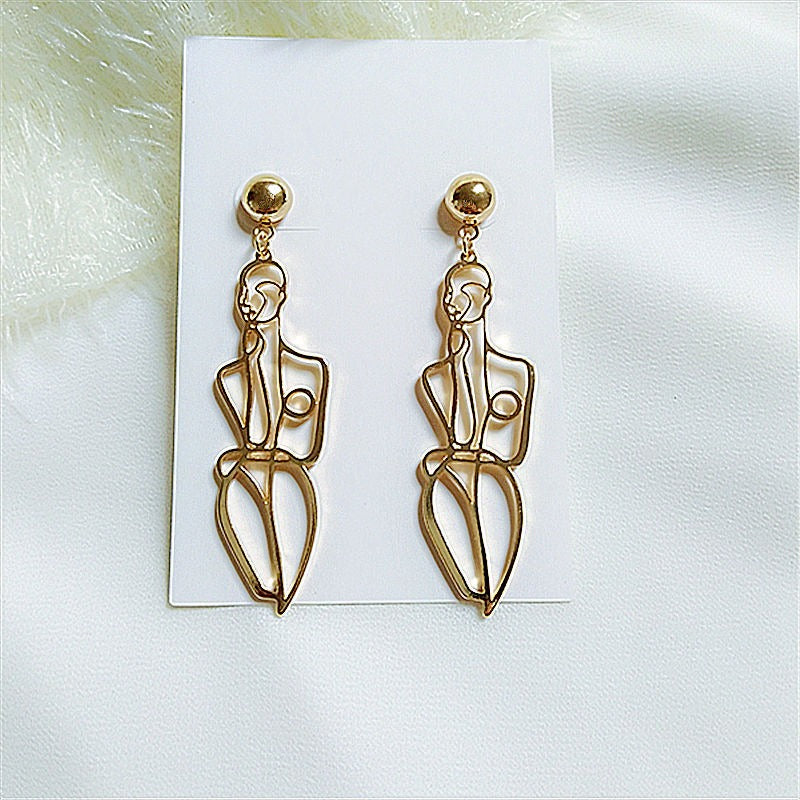 Human body contour shaped earrings