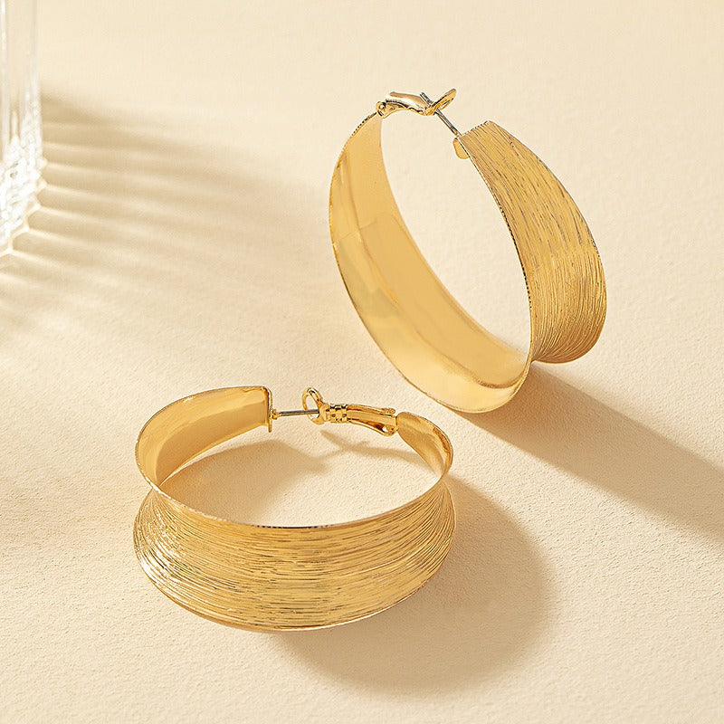 C-shaped large earrings