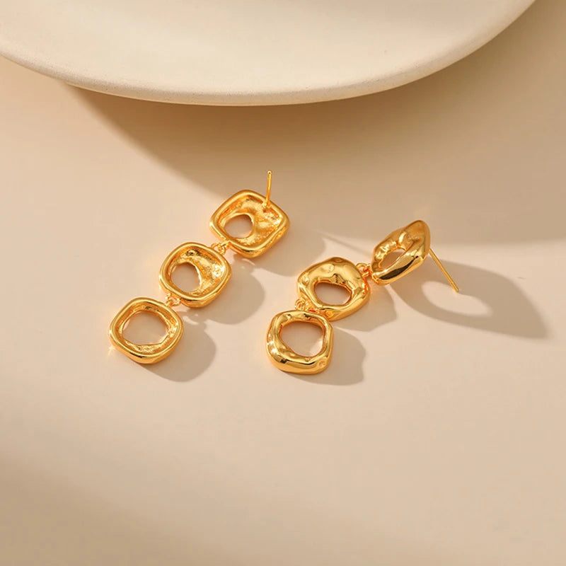 Irregular hollow design earrings brass plated 18K gold color