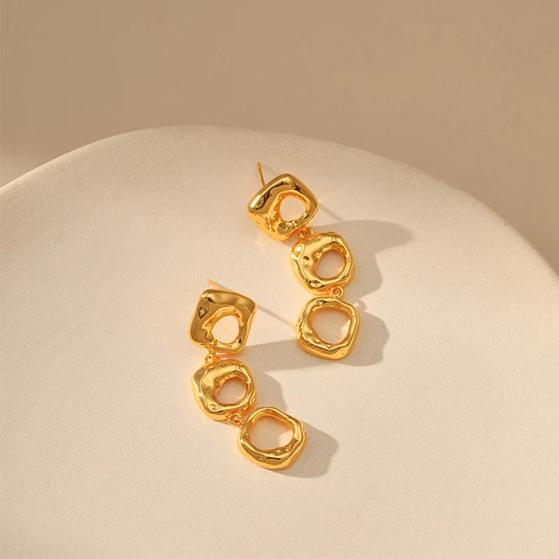 Irregular hollow design earrings brass plated 18K gold color