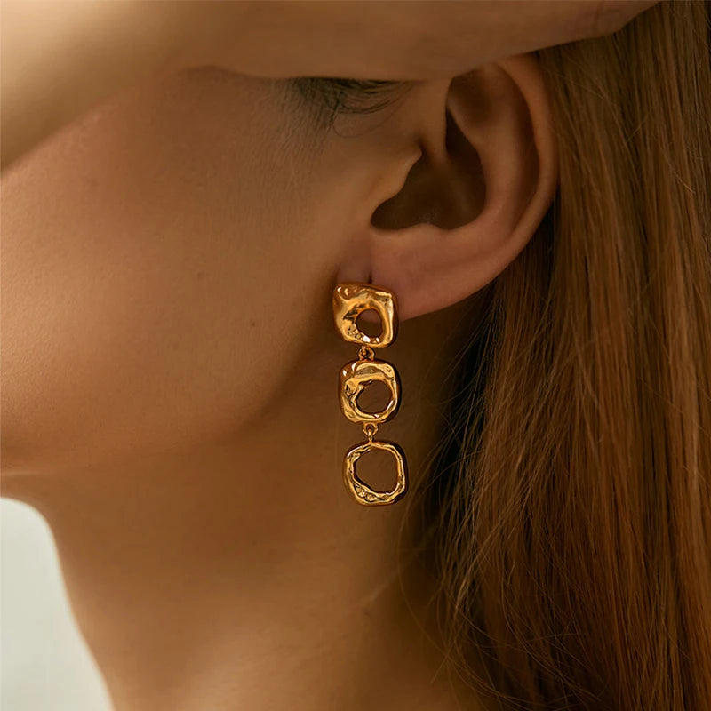 Irregular hollow design earrings brass plated 18K gold color