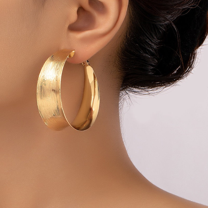 C-shaped large earrings