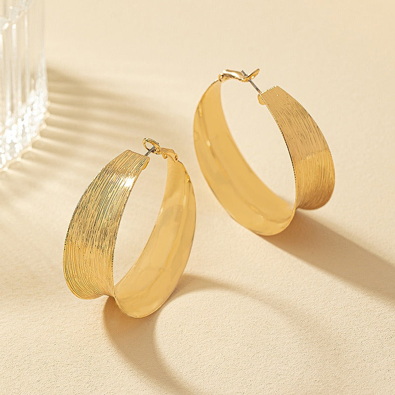 C-shaped large earrings